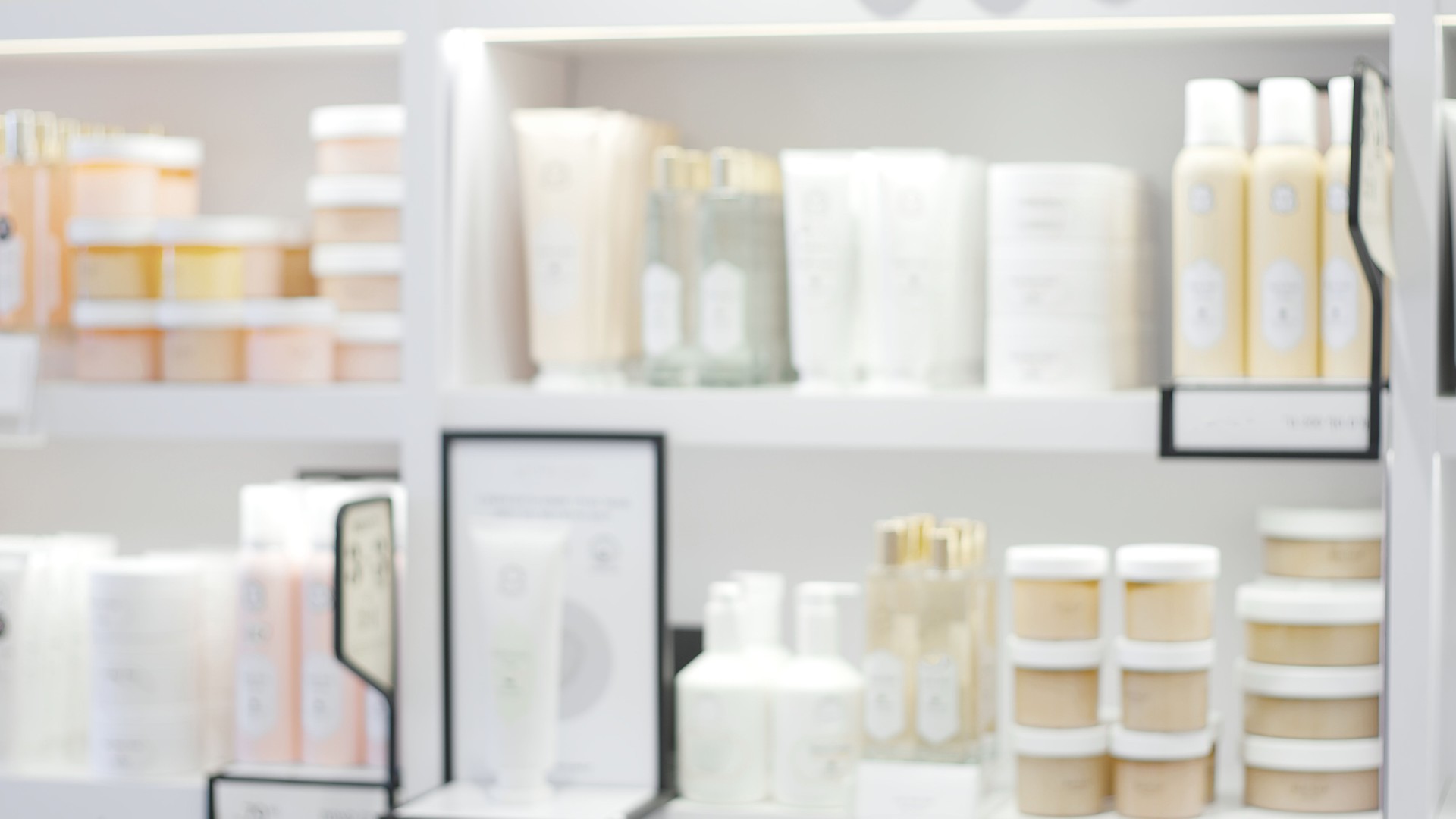 Beauty product shelves in skincare store